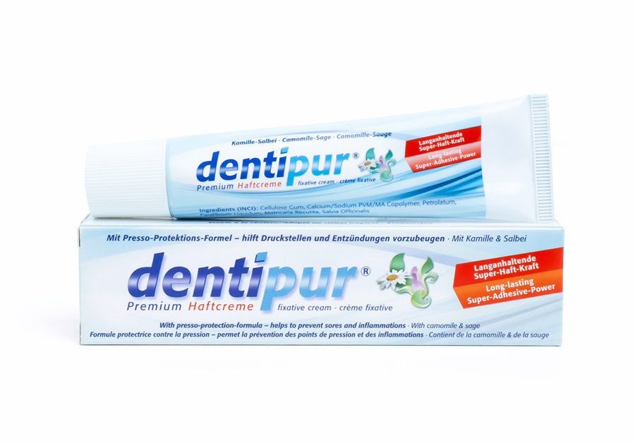 Premium adhesive cream with chamomile and sage extract